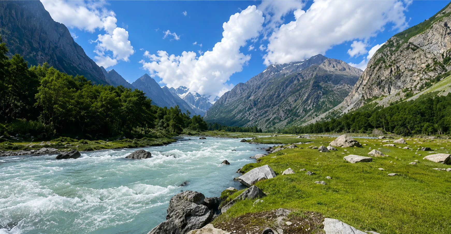 A clear mountain river running through a green Himalayan valley